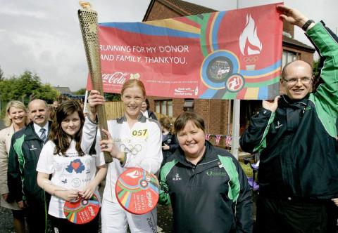 Transplant athlete carries Olympic Torch for Organ Donation