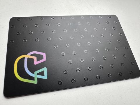 An image of the C-Card lying flat on a table, which allows young people free to register for free condoms and lubricants.