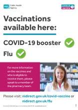 COVID and flu vaccine poster featuring smiling pharmacist